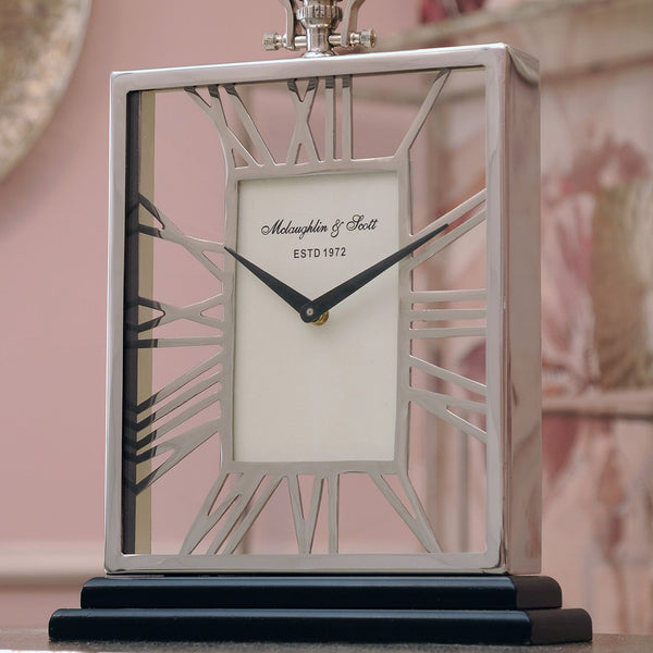Silver And Black Skeletal Mantel Clock