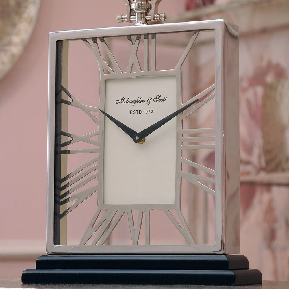 Silver And Black Skeletal Mantel Clock